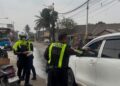 Polres Bogor Turun ke Jalan Bagikan Masker, Warga Diminta Waspadai Bahaya Abu Vulkanik